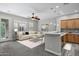 Stylish living room with neutral tones, modern decor, and adjoining kitchen area at 4777 S Fulton Ranch Blvd # 2071, Chandler, AZ 85248