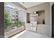 Balcony area featuring an outdoor kitchen with a built-in grill and vent hood at 5250 E Deer Valley Dr # 247, Phoenix, AZ 85054