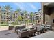 Inviting courtyard with plush seating, fire features, and palm trees for relaxation at 5250 E Deer Valley Dr # 247, Phoenix, AZ 85054