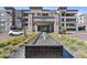 Modern apartment complex featuring a water feature and well-maintained landscaping at 5250 E Deer Valley Dr # 247, Phoenix, AZ 85054