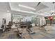 Well-equipped gym features various weights, machines, and mirrors for a complete workout experience at 5250 E Deer Valley Dr # 247, Phoenix, AZ 85054