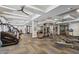Community gym with modern equipment, high ceilings, and large windows for natural light and ventilation at 5250 E Deer Valley Dr # 247, Phoenix, AZ 85054
