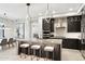 Contemporary kitchen boasts stainless steel appliances and a spacious island with seating at 5250 E Deer Valley Dr # 247, Phoenix, AZ 85054