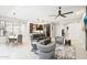 Spacious living area with dining table, modern furniture, and an open concept layout at 5250 E Deer Valley Dr # 247, Phoenix, AZ 85054
