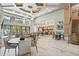 Expansive lobby featuring high ceilings, a lounge area, dining, and an open kitchen at 5250 E Deer Valley Dr # 247, Phoenix, AZ 85054