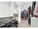Organized walk-in closet with shelving for shoes and hanging space for clothes at 5250 E Deer Valley Dr # 247, Phoenix, AZ 85054