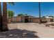 Charming home featuring a circular driveway and desert landscaping at 5420 N Granite Reef Rd, Scottsdale, AZ 85250