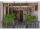 Charming front porch with well-manicured greenery and seating at 5420 N Granite Reef Rd, Scottsdale, AZ 85250