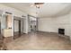 Spacious living room with fireplace and tile floors at 5420 N Granite Reef Rd, Scottsdale, AZ 85250