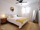 Cozy bedroom features natural light, neutral color tones, light wood floors, and stylish furnishings at 6835 E Friess Dr, Scottsdale, AZ 85254