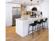 Well-appointed kitchen with stainless steel appliances, a breakfast bar and pendant lighting at 6835 E Friess Dr, Scottsdale, AZ 85254
