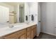 Bright bathroom featuring double sink, white cabinets and shower stall at 6862 W Honeysuckle Dr, Peoria, AZ 85383