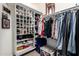 Well-organized closet includes shoe racks and hanging space for clothing storage at 6862 W Honeysuckle Dr, Peoria, AZ 85383
