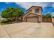 Charming two-story home with a well-manicured lawn and a two car garage at 6862 W Honeysuckle Dr, Peoria, AZ 85383