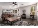 Spacious living room with an open floor plan and hardwood flooring throughout the home at 6862 W Honeysuckle Dr, Peoria, AZ 85383