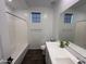 This bathroom features a shower and tub combo at 6947 W Spur Dr, Peoria, AZ 85383