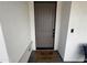 A welcoming, stylish front door enhances curb appeal and security with a modern digital lock at 6947 W Spur Dr, Peoria, AZ 85383