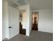 Spacious hallway providing access to various areas of the home at 6947 W Spur Dr, Peoria, AZ 85383