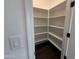 Walk-in pantry featuring extensive shelving for optimal organization and storage at 6947 W Spur Dr, Peoria, AZ 85383