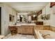 Well-appointed bathroom with large mirrors, vanity, tub, and television, for added relaxation and convenience at 7710 E Golden Eagle Cir, Gold Canyon, AZ 85118