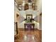 Grand foyer with a soaring ceiling, decorative mirror, and staircase leading to the upper level at 7710 E Golden Eagle Cir, Gold Canyon, AZ 85118