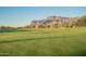 Scenic golf course with mountain views and well-manicured greens at 7710 E Golden Eagle Cir, Gold Canyon, AZ 85118