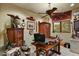 Functional home office featuring custom cabinets, a built-in desk, and ample storage space at 7710 E Golden Eagle Cir, Gold Canyon, AZ 85118