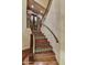 Beautiful staircase with decorative risers and a curved banister leading upstairs at 7710 E Golden Eagle Cir, Gold Canyon, AZ 85118