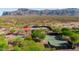 Multiple tennis courts in a community with desert landscaping and mountain views at 7710 E Golden Eagle Cir, Gold Canyon, AZ 85118