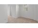A well-lit bedroom is cozy with its neutral carpet and window with blinds at 8817 W Denton Ln, Glendale, AZ 85305