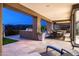 Relaxing outdoor patio with built in grill, dining and lounge chairs and a pool with amazing desert views at 9894 E Miramonte Dr, Scottsdale, AZ 85262