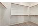 Walk-in closet with ample shelving and storage options at 10502 W Bronco Trl, Peoria, AZ 85383