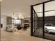 Elegant living room with comfortable seating, a fireplace, and views of the city skyline and car collection at 10772 E Canyon Cross Way, Scottsdale, AZ 85255