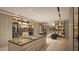 Organized walk-in closet with custom shelving, drawers, and ample space for clothing and accessories at 10772 E Canyon Cross Way, Scottsdale, AZ 85255