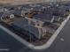Aerial view of home and neighborhood showcasing well-manicured lawns at 11019 E Tiburon Ave, Mesa, AZ 85212
