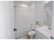 Clean bathroom with shower-tub combo, modern fixtures, and white color scheme at 11019 E Tiburon Ave, Mesa, AZ 85212