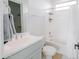 Spotless bathroom features a single vanity, tile floors, and shower-tub combo for convenience at 11019 E Tiburon Ave, Mesa, AZ 85212