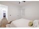 Comfortable bedroom featuring a bed, wood flooring, and natural light, creating a cozy and relaxing atmosphere at 11019 E Tiburon Ave, Mesa, AZ 85212