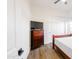 Bedroom with wood-look tile flooring, standard closet, and furnishings at 11019 E Tiburon Ave, Mesa, AZ 85212