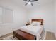 Inviting bedroom with a queen-sized bed, neutral tones, and cozy decor, perfect for relaxation and rest at 11019 E Tiburon Ave, Mesa, AZ 85212