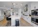 Bright, modern kitchen with stainless steel appliances, a large island, and ample counter space perfect for entertaining at 11019 E Tiburon Ave, Mesa, AZ 85212
