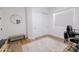 Another view of the office space with a padded bench and ample lighting at 11019 E Tiburon Ave, Mesa, AZ 85212