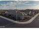 Street view of the home, surrounded by other homes in a well-planned community at 11019 E Tiburon Ave, Mesa, AZ 85212