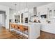 Modern kitchen with white cabinets, stainless steel appliances, and a large island at 1500 E Sagittarius Pl, Chandler, AZ 85249