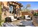 Inviting patio with comfortable seating and desert flora at 18127 N 98Th Way, Scottsdale, AZ 85255