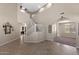 Open foyer with tile flooring, high ceilings, staircase and decorative accents, leading to various rooms at 2036 E Carob Dr, Chandler, AZ 85286