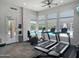 Well-equipped fitness center with treadmills, elliptical, and stationary bike overlooking the community pool at 23386 N 73Rd Way, Scottsdale, AZ 85255