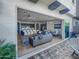 Seamless indoor-outdoor living with sliding glass doors leading to a modern, open-concept living space at 23386 N 73Rd Way, Scottsdale, AZ 85255