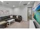 Comfortable living room with large sectional sofa, perfect for relaxing and entertaining at 23386 N 73Rd Way, Scottsdale, AZ 85255