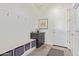 Functional mud room with built-in bench, storage cubbies, and hooks, great for organization at 23386 N 73Rd Way, Scottsdale, AZ 85255